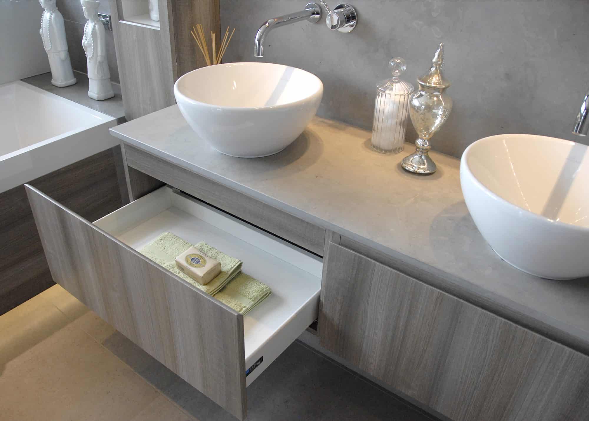 Armarii design and manufacture fitted furniture for bathrooms.